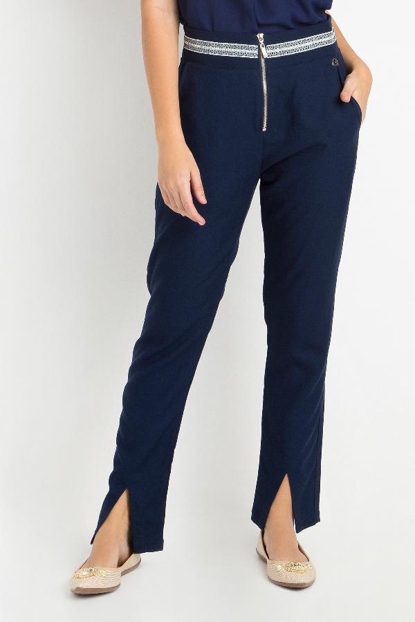 PANTALÓN SASTRE CON APLIQUE