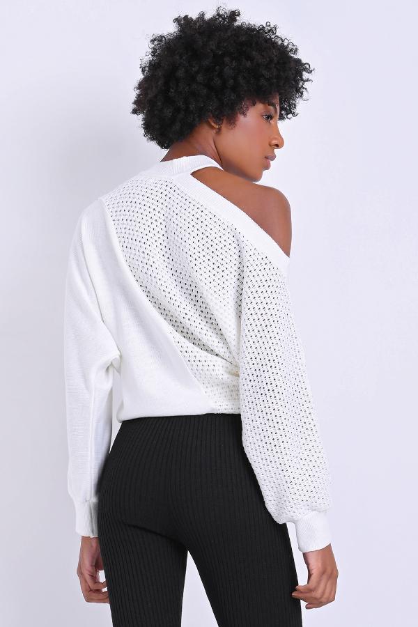 BLUSA DE CORTE ASIMÉTRICO