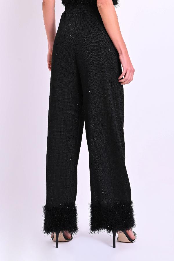 PANTALON CON VOLADO DE PELOS